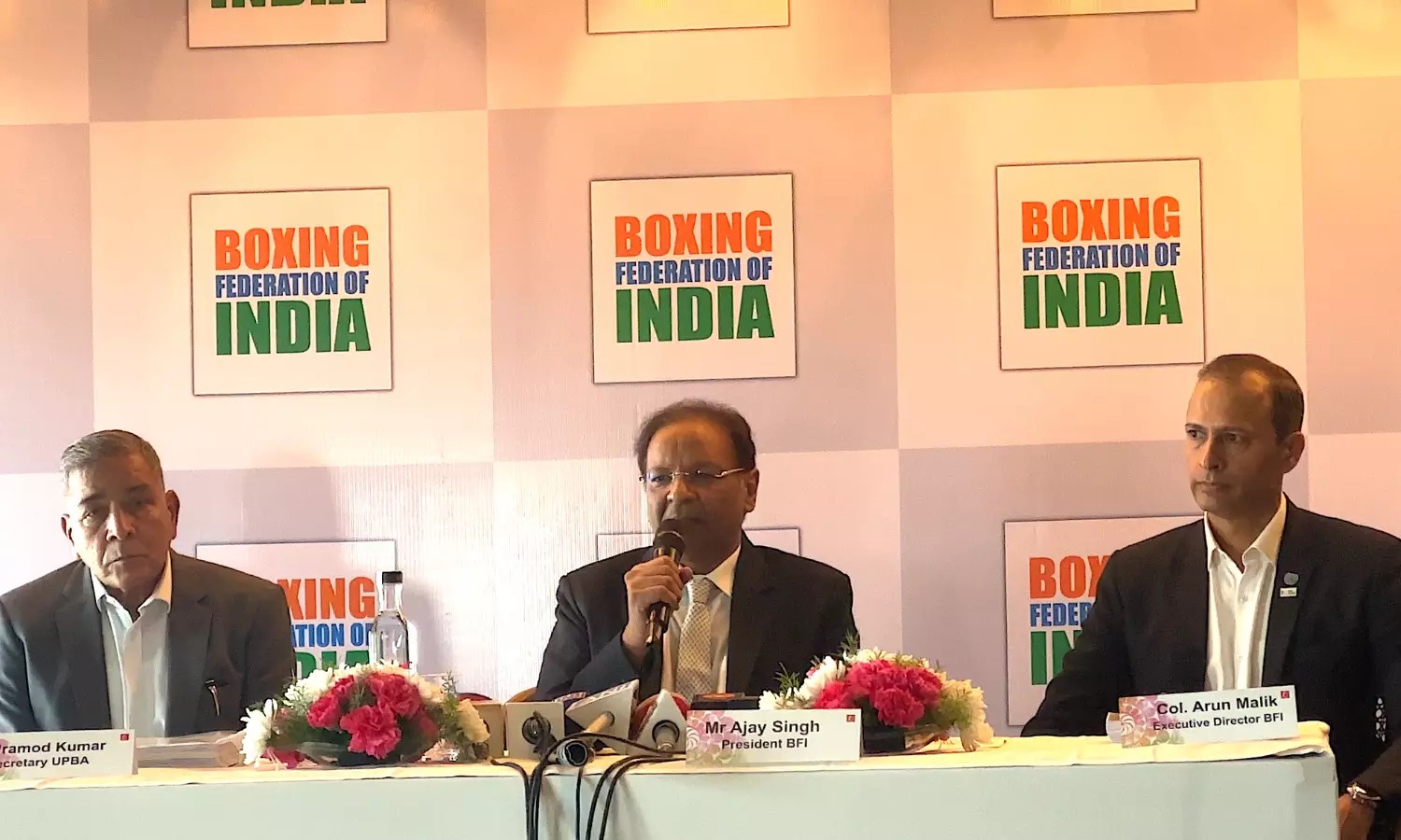 Boxing Federation of India suspends secretary general Pramod Kumar pending an inquiry.